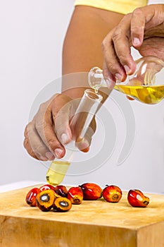 Pouring yellow palm oil