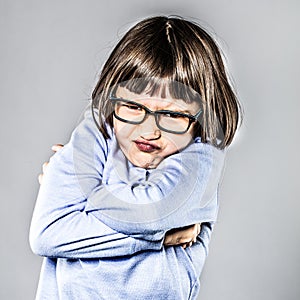 Pouting girl having mad tantrum, crossing her arms for disagreement