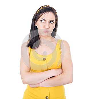 Pouting young woman, isolated on white background. Displeased young woman