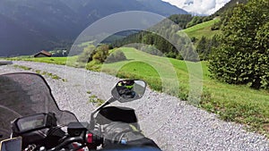 POV Biker Rides on Motorbike by Scenic Countryside Sunny Mountain Road Swiss Alp