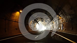 POV Driving car on highway, roadway, tunnel, driver traveling