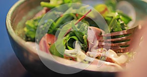 POV, eating fresh salad, smoked duck meat on a fork, food video