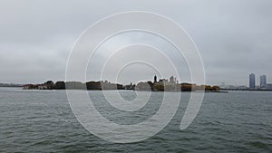 POV from Ferry on the Battery Park City, NYC in Manhattan, USA starting the winter in Hudson River