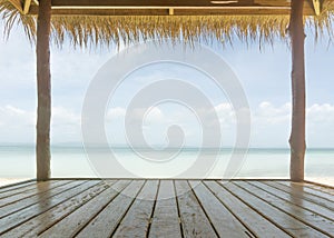 Pov inside rustic pavilion with beach background