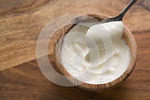 Pov shot of full spoon of yogurt