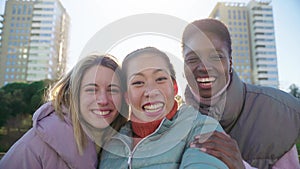 POV Shot: Group of Young Multiethnic Female Teenagers Having a Video Call Using a Smartphone.