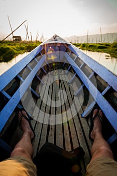 POV sitting on a lila boat Inle Lake photo