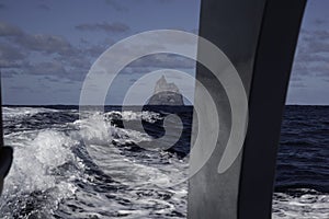 POV from boat moving away from BallÃ¢â¬â¢s Pyramid Lord Howe Island Australia photo