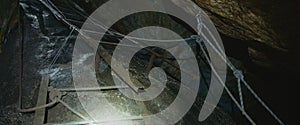 Pov view of the old stairs and rope, exit from the cave.The cave attraction landmark for tourists seeking adventure and