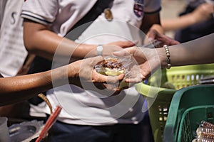 Poverty concept feeding food for beggar