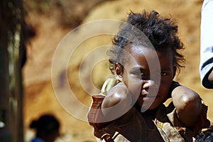Poverty, portrait of a poor little African girl