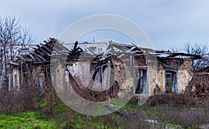 Poverty and unemployment. Ruined old-fashioned house