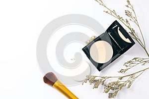 Powder foundation cream cusion fashion makeup skincare with brush and tree leaf herbal photo