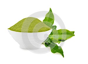 Powder green tea and green tea leaf on white background