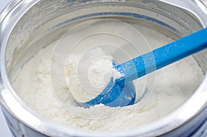 Powdered milk with spoon for baby photo