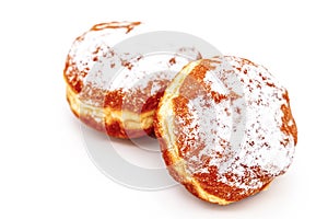 Powdered sugar donuts isolated on a white backgroundPowdered sugar donuts isolated on a white background