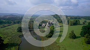Powderham Castle and Powderham Park from a drone, Powderham, Exeter, Devon, England
