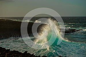 Power of the atlantic ocean. Huge wave close to cliff