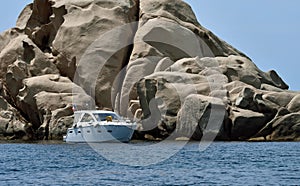 Power boat at anchor.