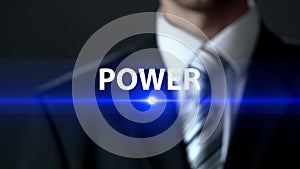 Power, businessman in suit standing in front of screen, influence and strength photo