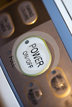 Power on button on electrical device. Close up button photo