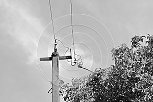 Power electric pole with line wire on background close up