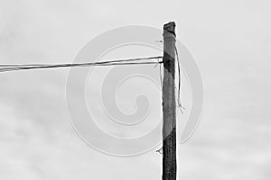 Power electric pole with line wire on background close up