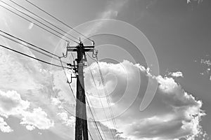 Power electric pole with line wire on light background close up