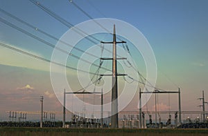 Power electricity pylons sunset