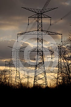 Power - Electricity Pylons and Lines at Sunset