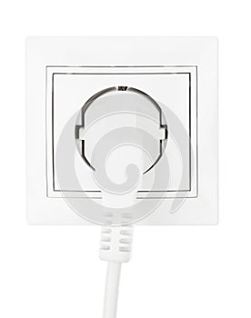 Power European electric plug isolated on a white.  electric cord plugged into a white electricity socket on white background