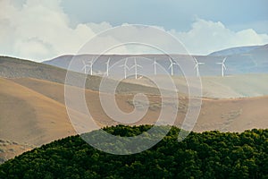 Power Generation Eolic Wind Turbines Field In Spain