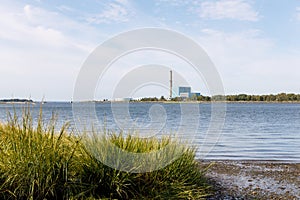 Power generator on the sea shore photo