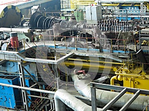 Power generator steam turbine in repair process, machinery, pipes, tubes at power plant