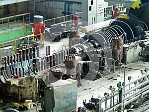 Power generator steam turbine in repair process, machinery, pipes, tubes at power plant