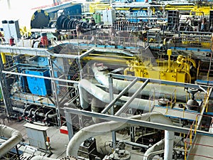 Power generator steam turbine in repair process, machinery, pipes, tubes at power plant