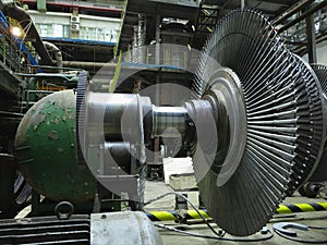 Power generator steam turbine in repair process, machinery, pipes, tubes at power plant