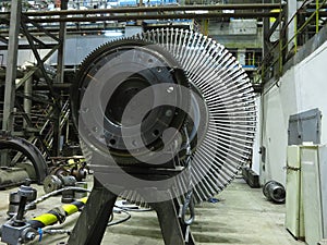 Power generator steam turbine in repair process, machinery, pipes, tubes at power plant