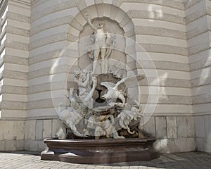 The Power On Land fountain, at the Michaelerplatz in Vienna, Austria
