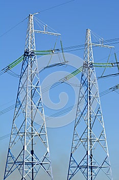 Power line against the blue sky