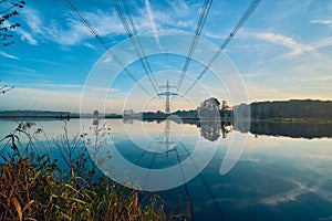 Power line over lake in northern Germany