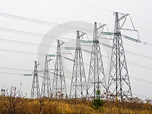 Power line posts with wires high voltage