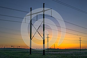 Power line in sunrise light