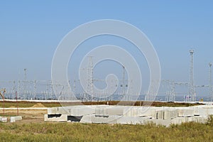 Power line support, insulators and wires. Appearance of a design. Assembly and installation of new support and wires of a power li