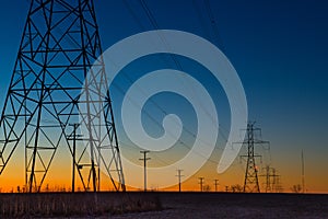 Power line towers during blue hour