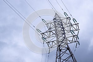 Power lines against the background of a gloomy sky. The concept of energy security.