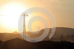 Power lines and array of electric pylons