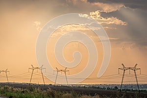 Power lines on a background of clouds coral