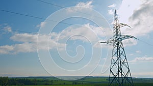 Power lines and blue sky. Electricity - high voltage power lines. Energy transfer. Time lapse.