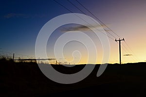 Power lines by a country road